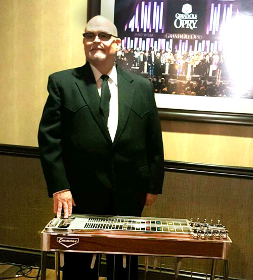 Johnny Cox with his restored Emmons steel guitar